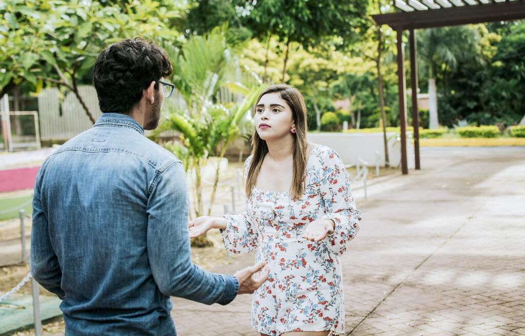 Two people argue outside due to struggles with anxiety. Couples Counseling in San Antonio, TX can help you overcome anxiety and strengthen your relationship.