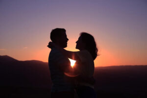 Couple holding each other, reassurance, love, in the sunset. Modern Wellness Counseling. San Antonio, Tx. 78255,78259,78249,78256.