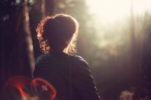 Woman staring out into the sun, thinking, getting fresh air. Modern Wellness Counseling. San Antonio, Tx. 78249,78240,78255,78258.78260.