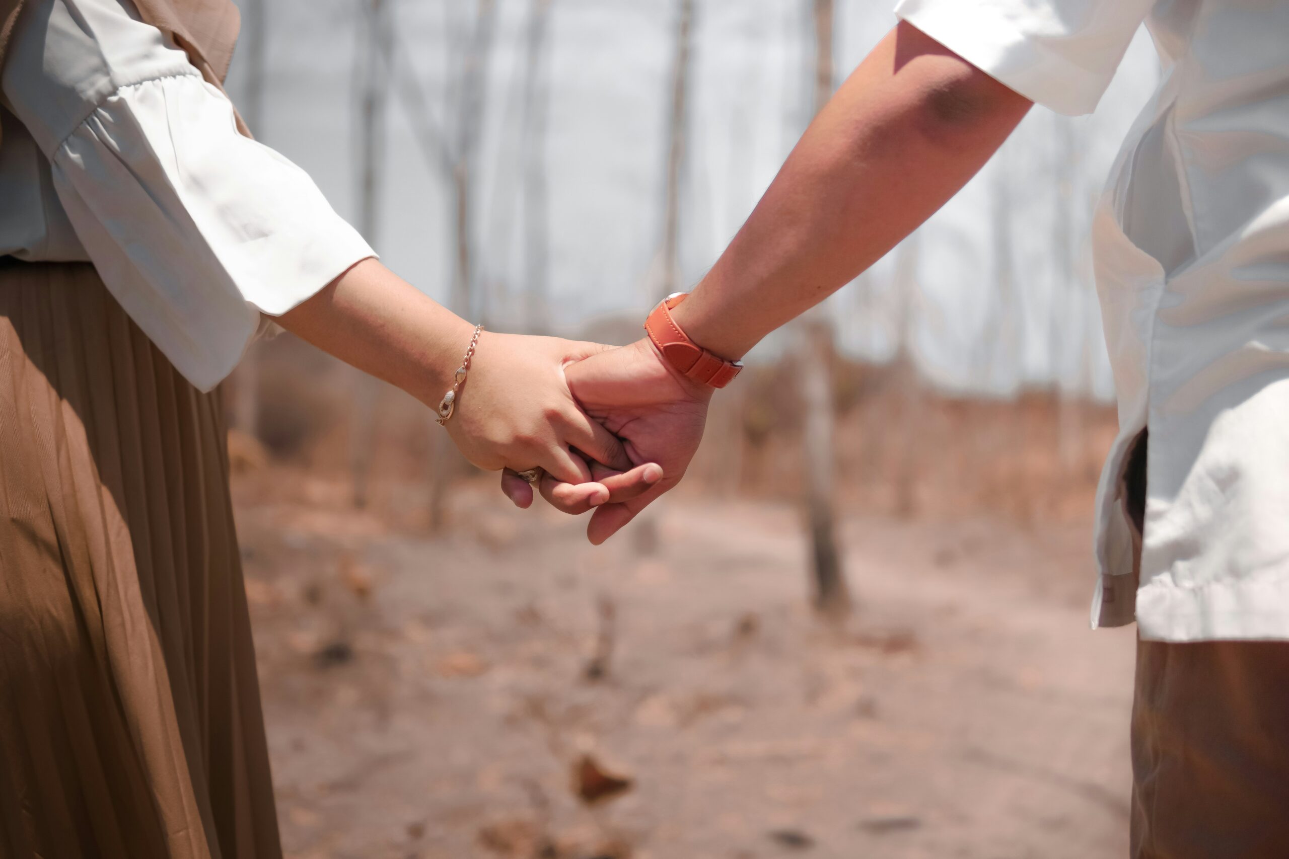 Couple holding hands closely together. Modern Wellness Counseling, San Antonio, Tx. 78230,78245,78249,78255,78258.