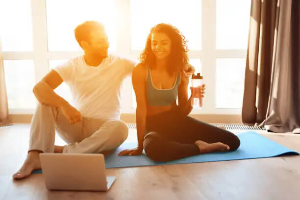 Couple in a comfortable setting doing an online couples counseling session in San Antonio, Texas - 78249, 78230, 78228, 78216, 78258, 78251, 78212