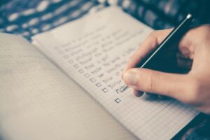 Couple making a list of household responsibilities in San Antonio, Texas. 78249, 78229, 78256, 78257, 78759, 78727, 77005, 75225